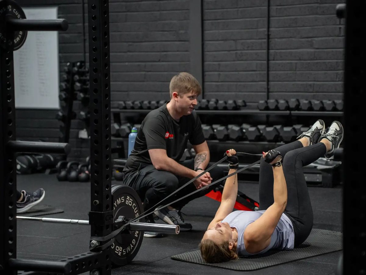 A coach working one to one with a member