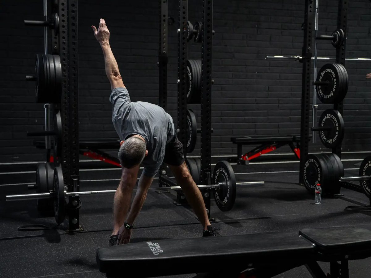 A member training on the gym floor